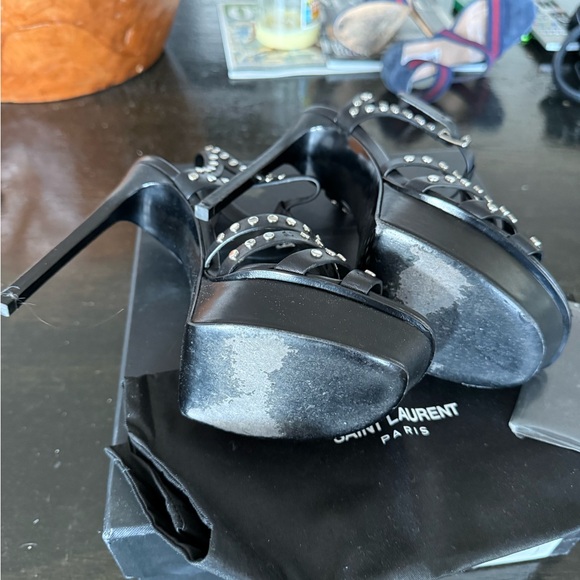 Yves Saint Laurent Black Leather Classic Tribute
Studded T-strap Platforms - Picture 9 of 10